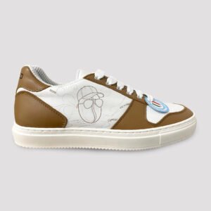 1 shoe in white and brown leather, white sole and big print of a coffee business on the side